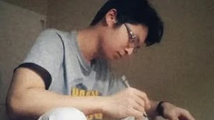 Thanh Do in studio drawing